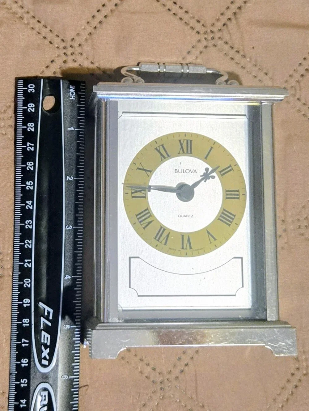 Bulova Silver Clock with Gold Dial Accent
